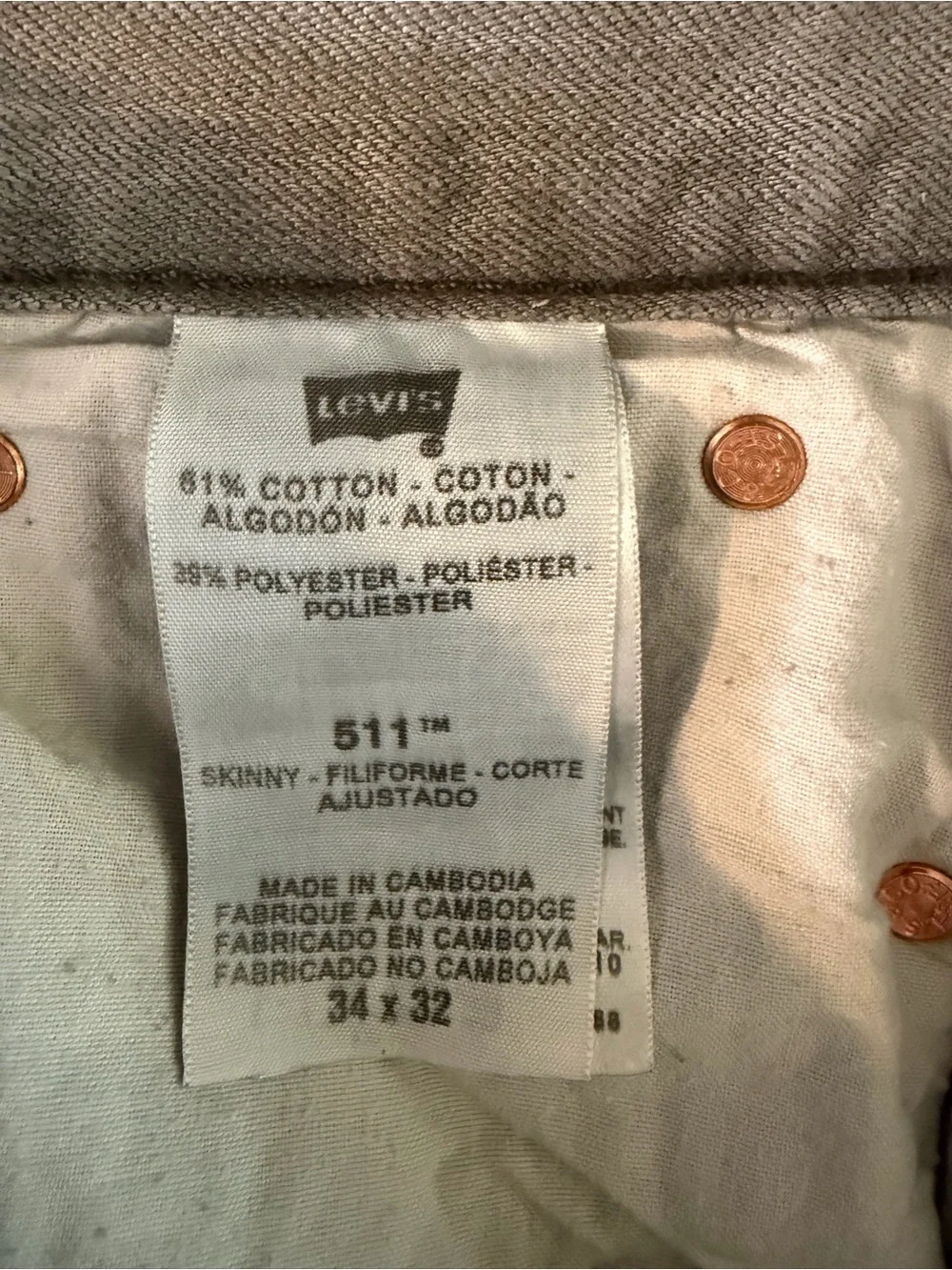 Levi's 511 Slim Fit jeans in a faded light grey wash.